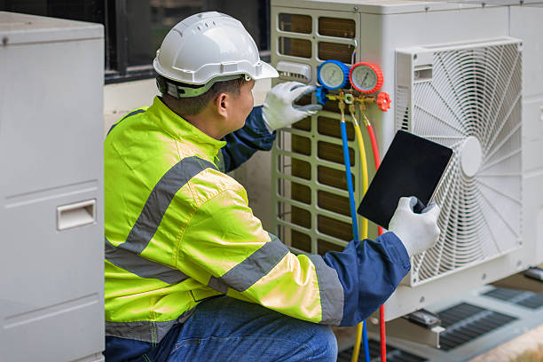 Professional Hvac technician working in Holladay, UT